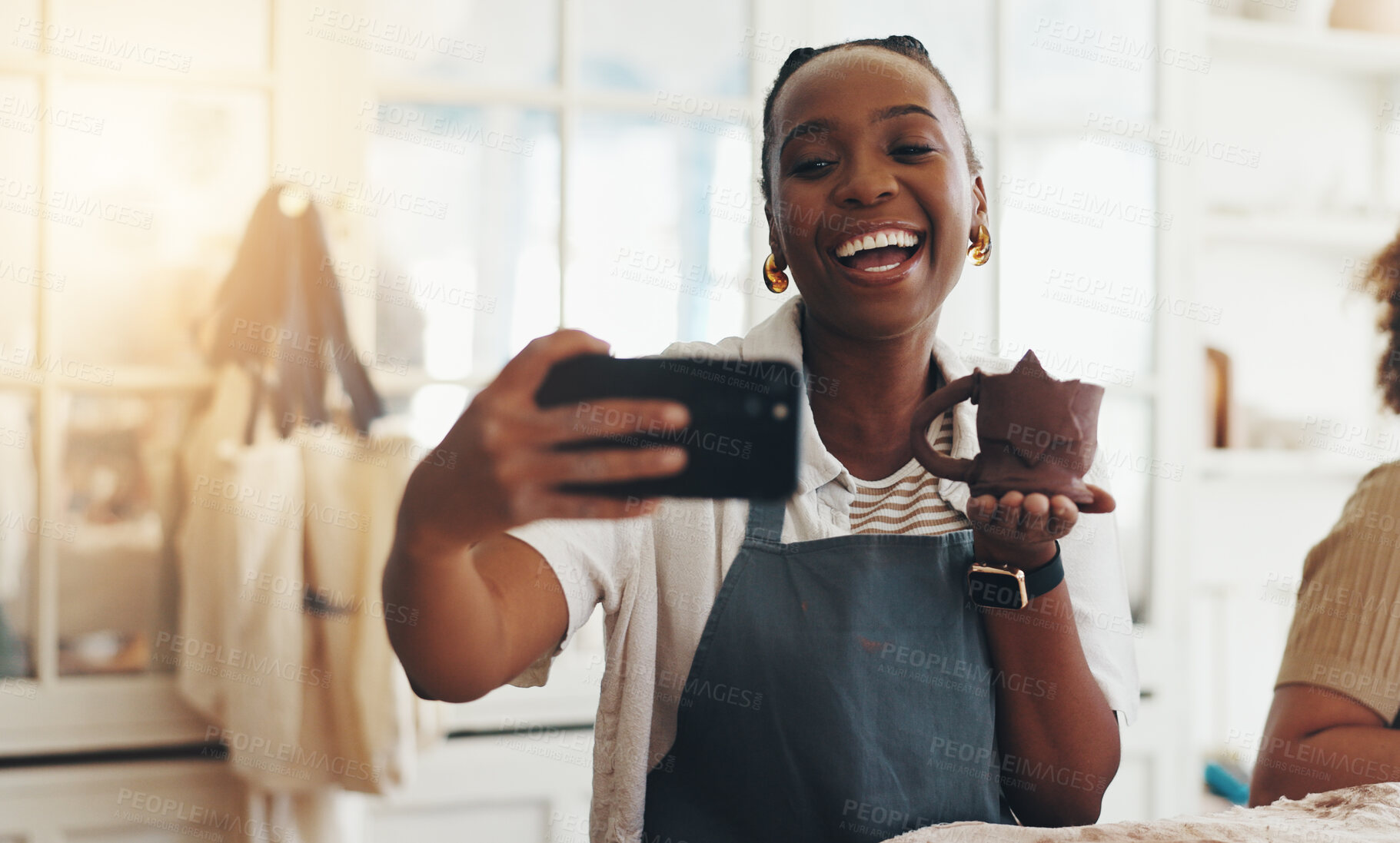 Buy stock photo Woman, selfie and pottery in creative studio, workshop and art process for handmade ceramic design. Craft, hobby and artist with phone, artwork and social media in clay class for sculpture post