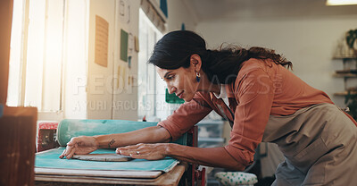 Buy stock photo Pottery, creative and woman with clay on table for sculpture for molding texture, production and art skills. Ceramics, workshop and female artist in small business with hobby, design or craft project