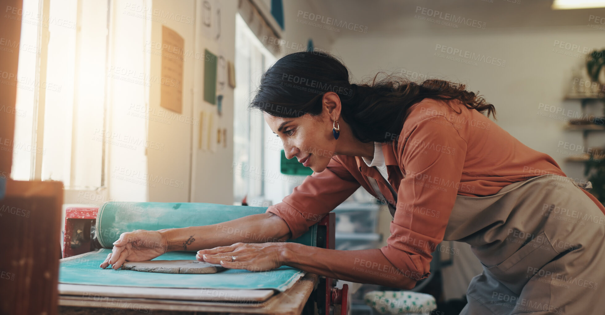 Buy stock photo Pottery, creative and woman with clay on table for sculpture for molding texture, production and art skills. Ceramics, workshop and female artist in small business with hobby, design or craft project