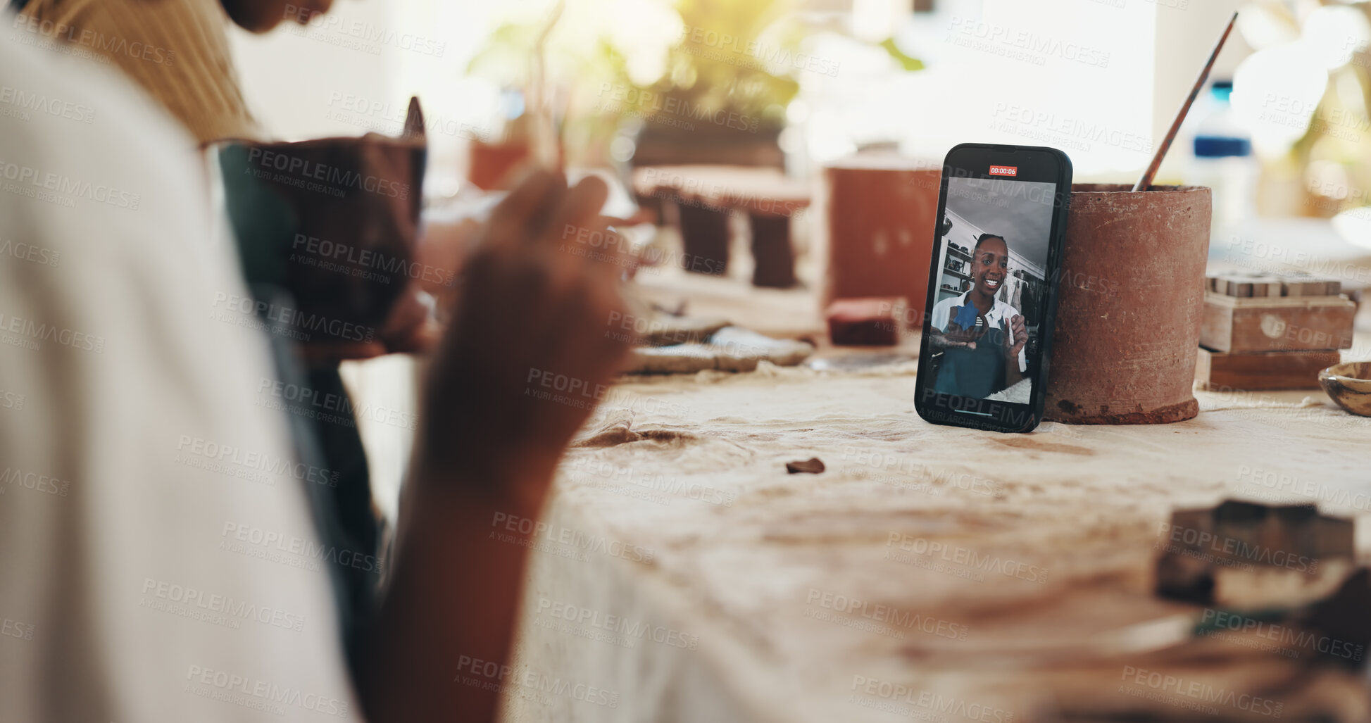 Buy stock photo Black woman, phone screen and pottery with video recording for vlog, ceramic tutorial or crafting lesson at workshop. Hands, female person or artisan with smile for DIY, online art or virtual class