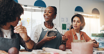 Buy stock photo Woman, pottery and class with group, ceramic product and teaching for craft, art and sculpture tutorial. Person, coach and learning with clay, design and guide with smile for course with creativity