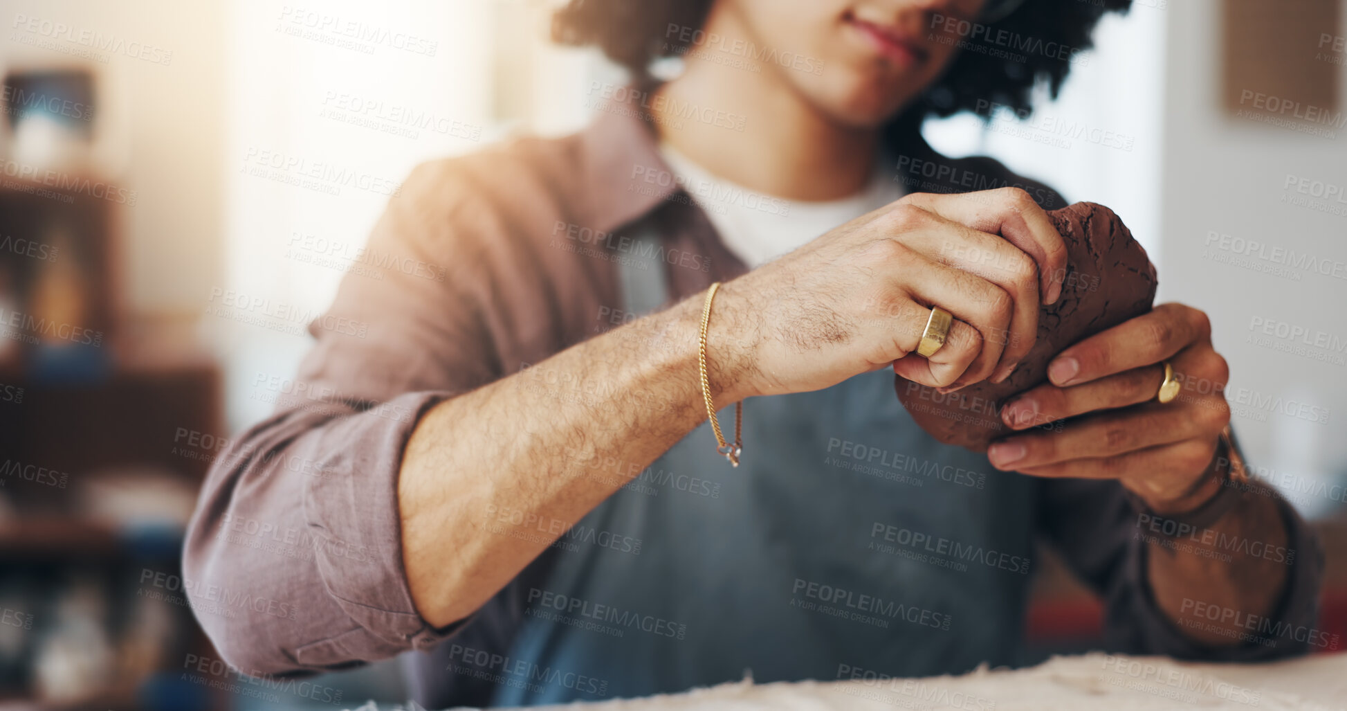 Buy stock photo Hands, pottery and man with clay in workshop for artistic process, design or production. Creative, sculpting and male person working on ceramic piece for startup business with manufacturing mud.