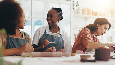 Buy stock photo Women, friends and happy at pottery class with learning, development or creativity at workshop. People, smile and conversation with course, lesson and diversity with tools for sculpture in art studio