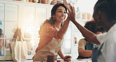 Buy stock photo Women, high five and celebration at class for pottery, goals and success with results at workshop. People, cheers and smile with support, motivation and yes for progress with sculpture at art studio