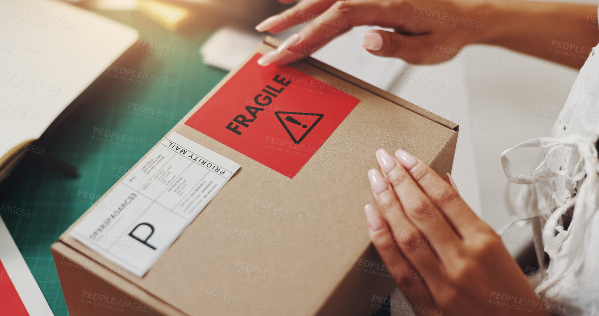 Buy stock photo Hands, woman and box with fragile sticker for distribution, order invoice and shipping information. Person, packaging and ecommerce warning with package delivery, export caution and small business