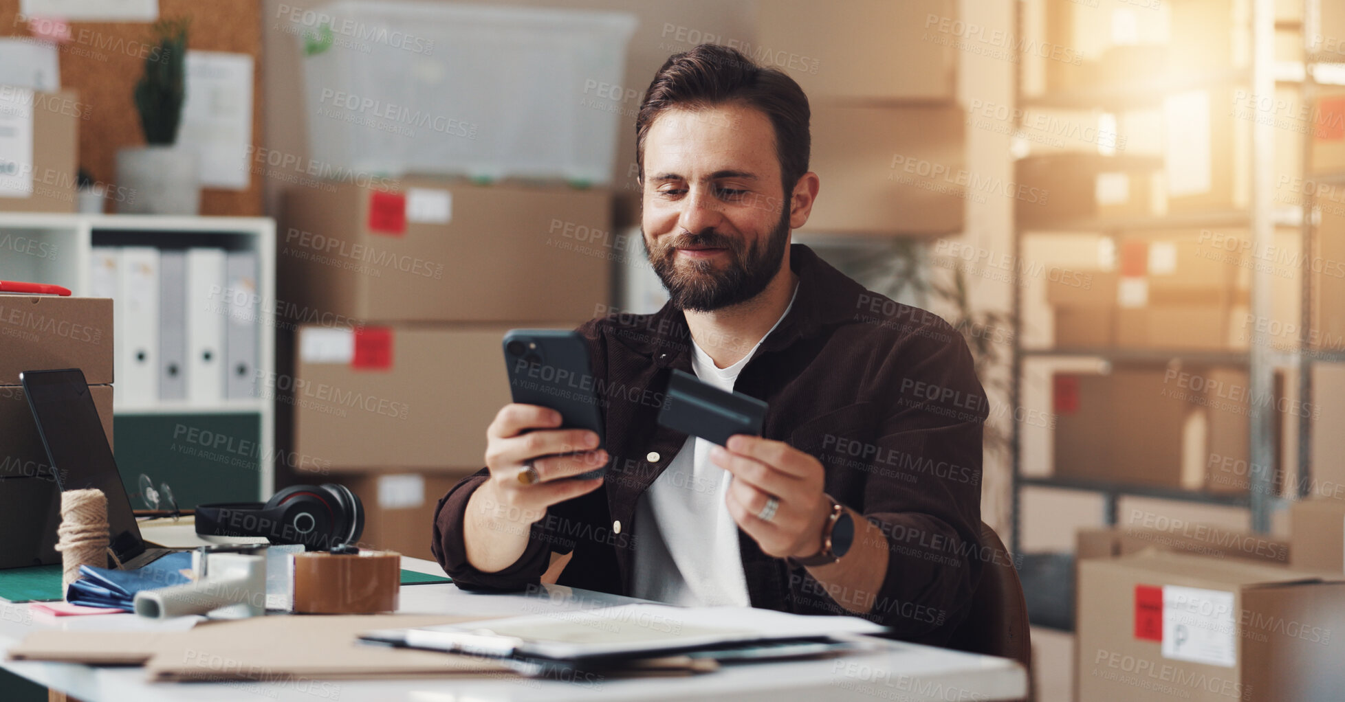 Buy stock photo Happy man, phone or online shopping with credit card for logistics, ecommerce or buying stock at warehouse. Male person, distributor or wireless payment on mobile smartphone for distribution business