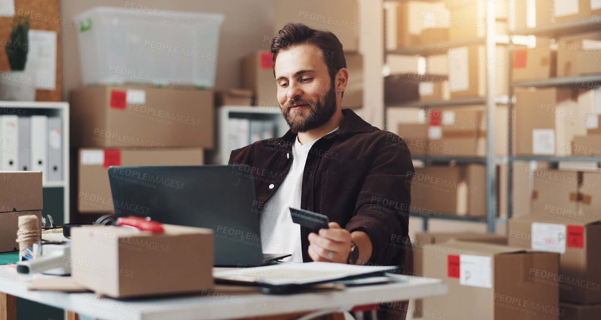 Buy stock photo Happy, businessman and laptop with credit card for ecommerce, logistics or buying stock at warehouse. Man, distributor or online shopping with computer or debit for shipping or distribution business