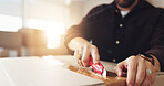 Shipping, box cutter and logistics with hands of person for product return, dropshipping and cargo stock. Packaging, distribution and courier parcel with closeup of employee in factory for delivery