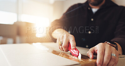 Buy stock photo Shipping, box cutter and logistics with hands of person for product return, dropshipping and cargo stock. Packaging, distribution and courier parcel with closeup of employee in factory for delivery