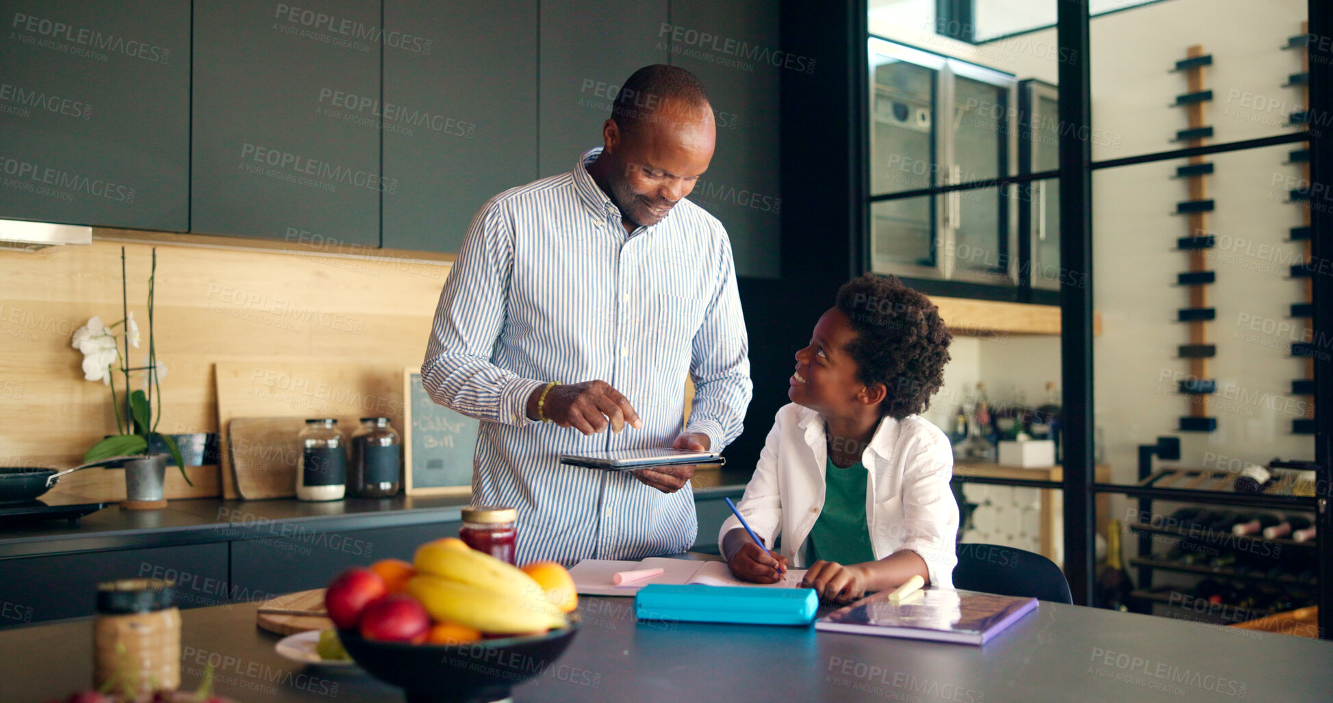 Buy stock photo Homework, kid or father with tablet in home for elearning lesson, learning support or study. Black family, student or books for academic project, knowledge development or online assessment in kitchen