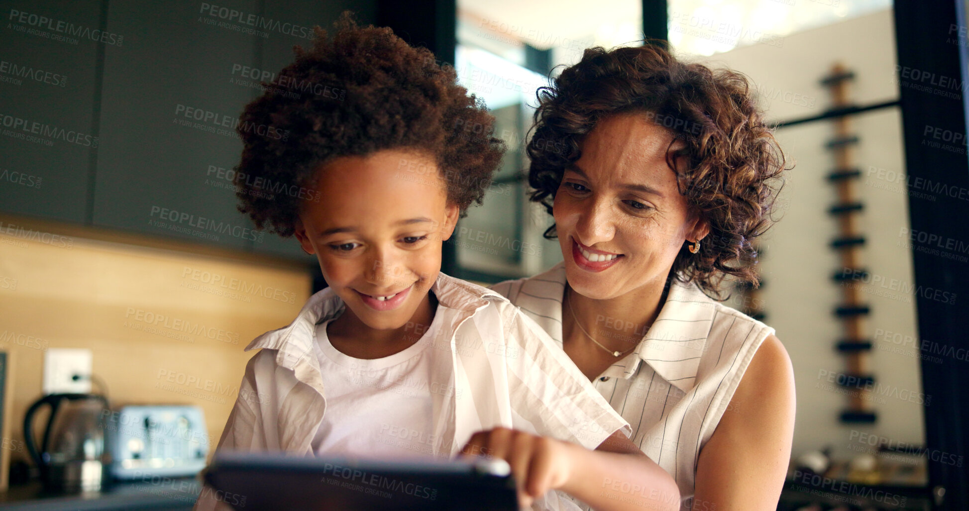 Buy stock photo Tablet, mother and child care for education in home, e learning and support with knowledge. Mom, son and website for streaming entertainment in kitchen, love and happy family for bonding together