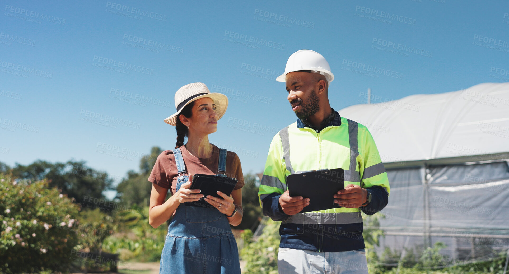 Buy stock photo People, agricultural engineer and farmer on field for irrigation system project, sustainability and quality assurance. Water management, discussion and farm inspection for biodiversity conservation