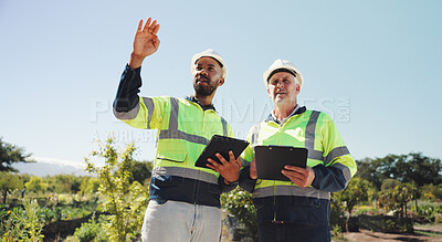 Buy stock photo Outdoor, architecture or business people with tablet for construction, project development or research. Men team, contractor or mature architect with clipboard for discussion, inspection or checklist