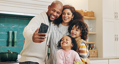 Buy stock photo Happy family, kitchen and picture with selfie for photography, memory or bonding together at home. Dad, mom and children or young siblings with smile for capture moment, weekend or holiday at house