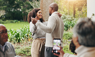 Buy stock photo Couple, dancing and outdoor phone for photography, recording passion and love in relationship. Happy people, nature and capture memory of romance in marriage, social media and family easter party