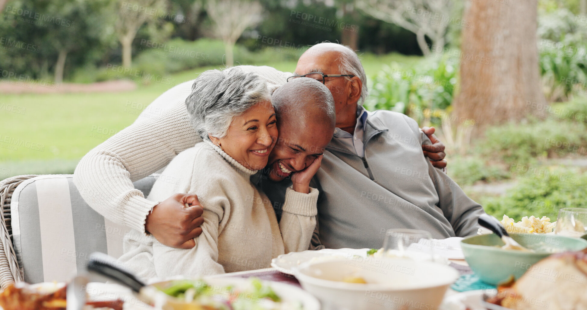 Buy stock photo Lunch, garden and senior parents with man with food for eating, family holiday and festive season. Christmas, Thanksgiving and mom, dad and son at supper, dinner party and meal together in backyard