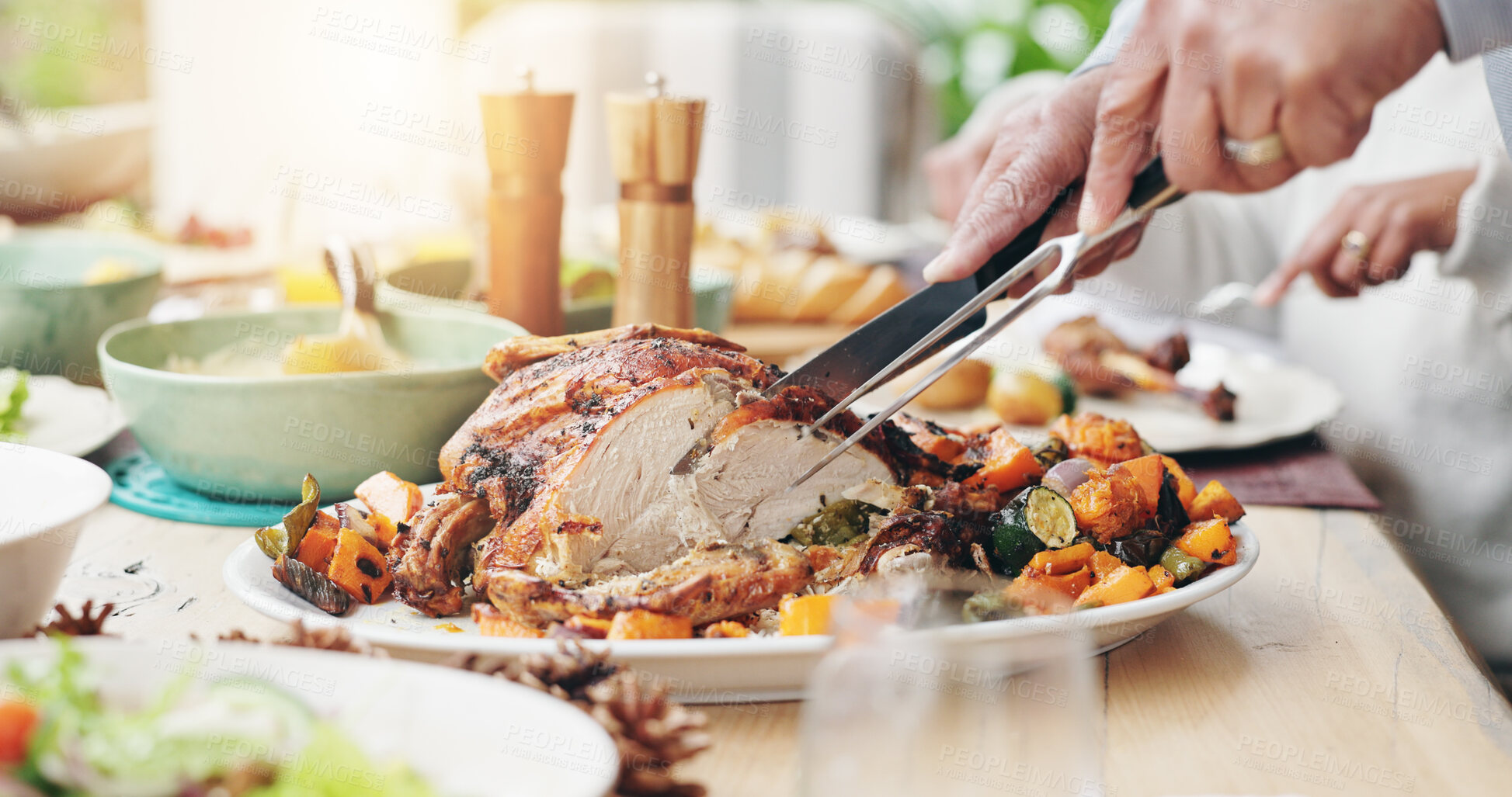 Buy stock photo People, hands or cutting turkey with thanksgiving dinner for family meal, lunch or dishing food at home. Closeup, chicken or plate with cuisine for hospitality, get together or eating at dining table