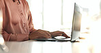 Business, office and hands of woman at laptop for contact, email and networking. Person, computer and typing in workplace for planning, communication and update schedule in program with connectivity