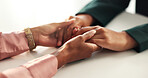 Holding hands, support and couple in home for love, compassion and communication on table. Relationship, dating and closeup of man and woman with affection or gesture for commitment, trust or comfort
