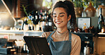 Cafe, woman and happy with tablet for small business, hospitality and tracking stock with tech. Coffee shop, female person and barista with digital for customer service, retail store or alcohol order