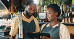 Restaurant, manager and people on tablet for training for inventory, menu items and checklist in hotel. Alcohol, business and man and woman on digital tech for hospitality, service and online order
