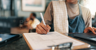 Buy stock photo Writing, checklist and planning with hands in cafe for product inventory, supplier list or budget clipboard. Menu discount, restaurant and small business owner with closeup of person in coffee shop