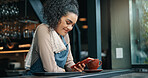 Woman, waiter and phone for texting at cafe, social media break and communication in coffee shop. Internet, hospitality service and female person online in restaurant, reading message and chat app