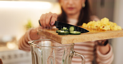 Buy stock photo Woman, home and hands with vegetables in blender for cucumber smoothie, breakfast shake and healthy nutrition. Person, knife and cutting board in kitchen for ingredients prep, organic diet and detox