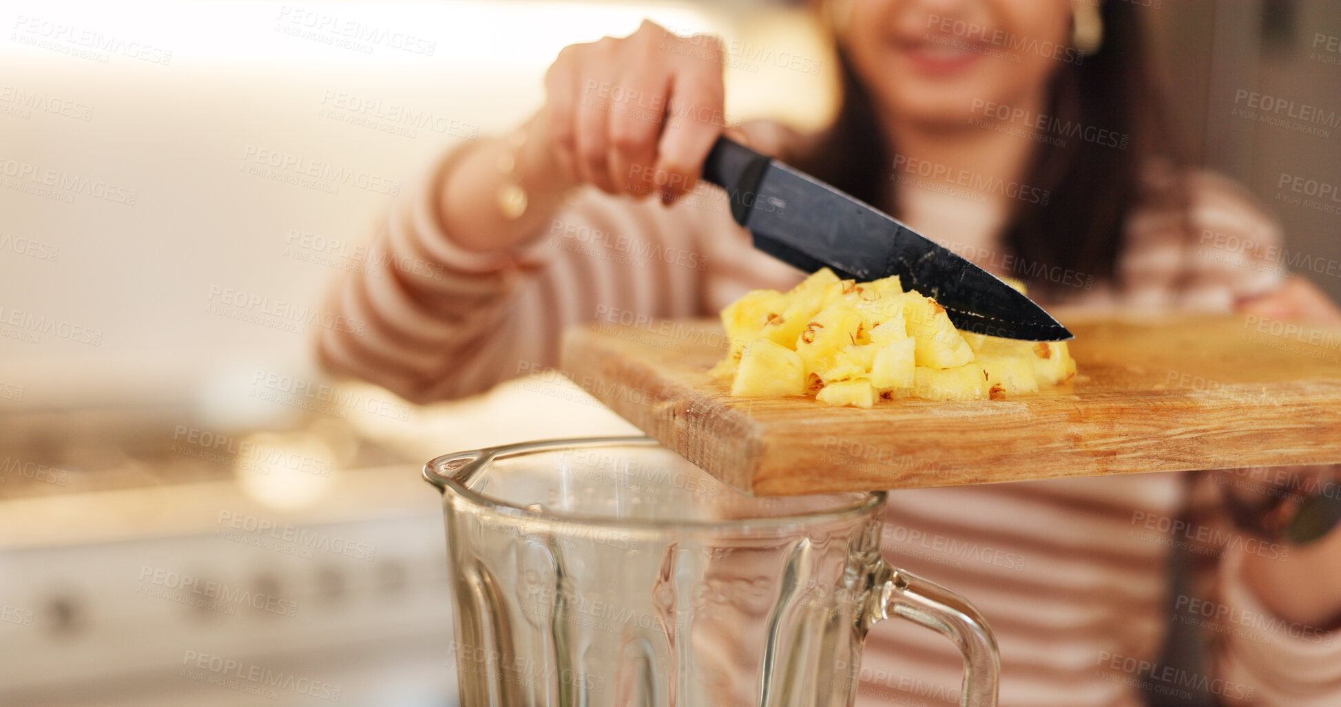 Buy stock photo Woman, home and hands with fruit in blender for pineapple smoothie, breakfast drink or healthy nutrition. Person, knife or cutting board in kitchen for ingredients preparation, organic diet or recipe