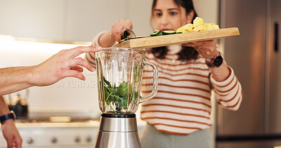 Buy stock photo People, home and hands with ingredients in blender for weight loss smoothie, breakfast drink or healthy nutrition. Couple, vegetables or cutting board in kitchen for shake preparation or organic diet