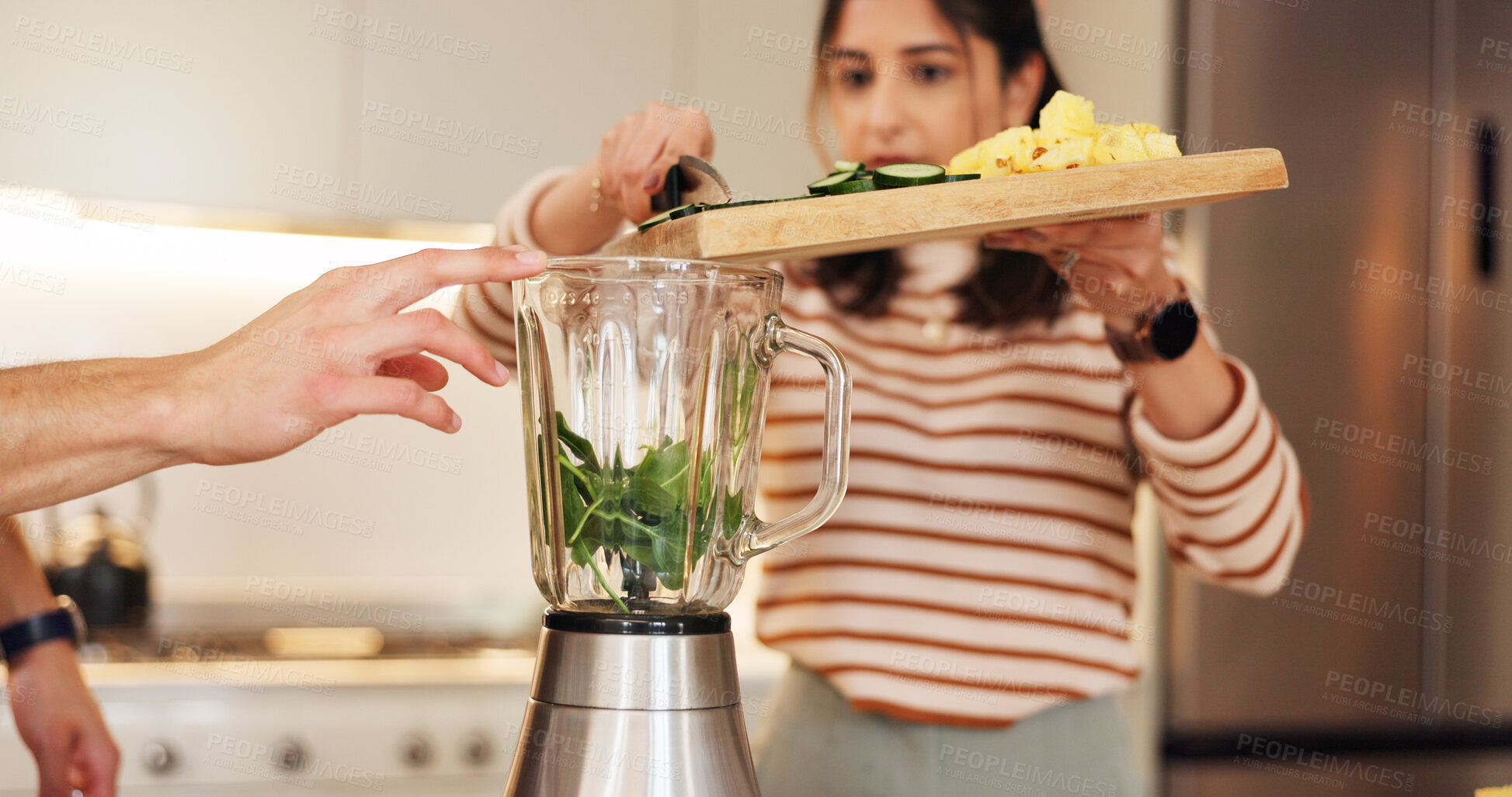Buy stock photo People, home and hands with ingredients in blender for weight loss smoothie, breakfast drink or healthy nutrition. Couple, vegetables or cutting board in kitchen for shake preparation or organic diet