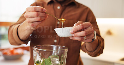 Buy stock photo Person, home and hands with ingredients in blender for healthy smoothie, breakfast drink and gut health. Nutritionist, detox and honey in kitchen for shake preparation, organic diet and antioxidant