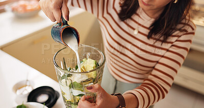 Buy stock photo Woman, smoothie and hands with milk in blender for weight loss shake, meal replacement or vitamins nutrition. Person, above or ingredients prep in kitchen for organic diet, gut health or healthy food