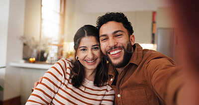 Buy stock photo Couple, selfie and laughing in home embrace, photography and capture memory in relationship. Partner, romance and social media update on commitment, bonding and post moment of affection in marriage