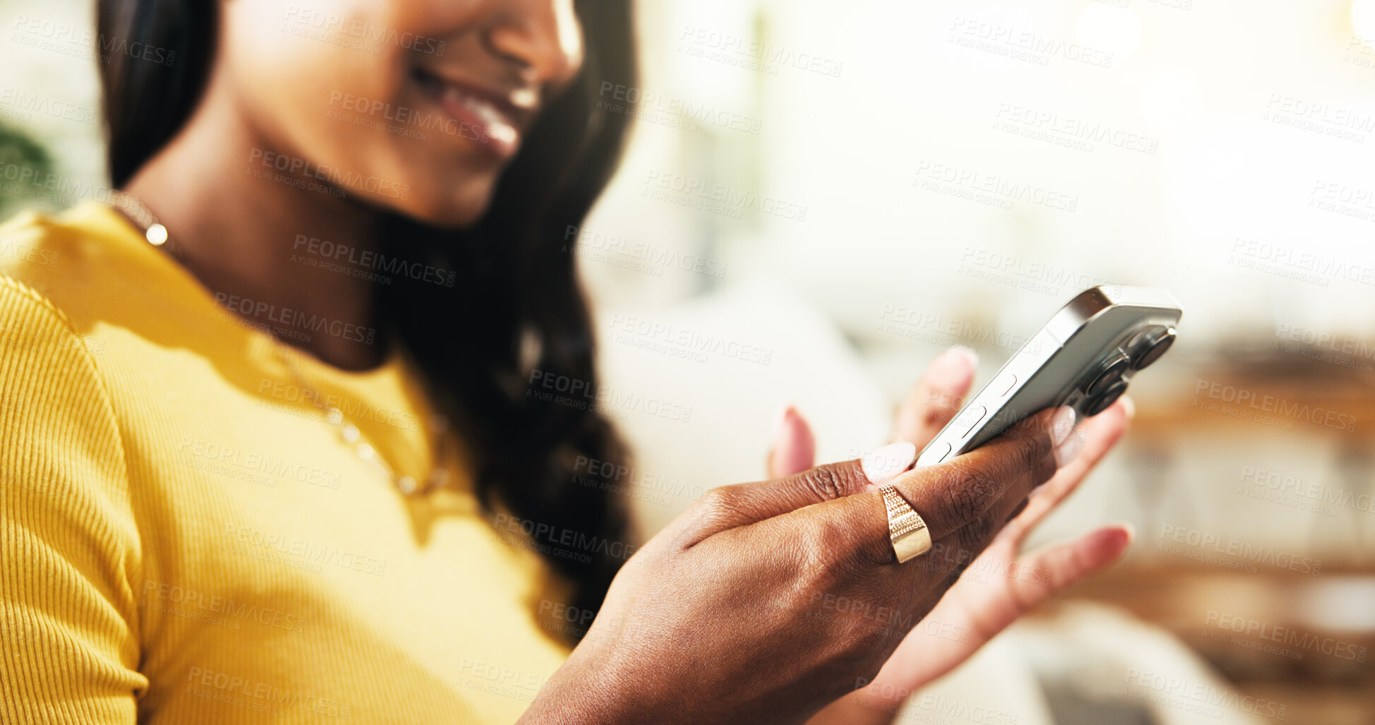 Buy stock photo Hands, phone and reading with woman on sofa for social media post, streaming and network platform. Chat, notification and mobile app with closeup of person in living room of home for story update