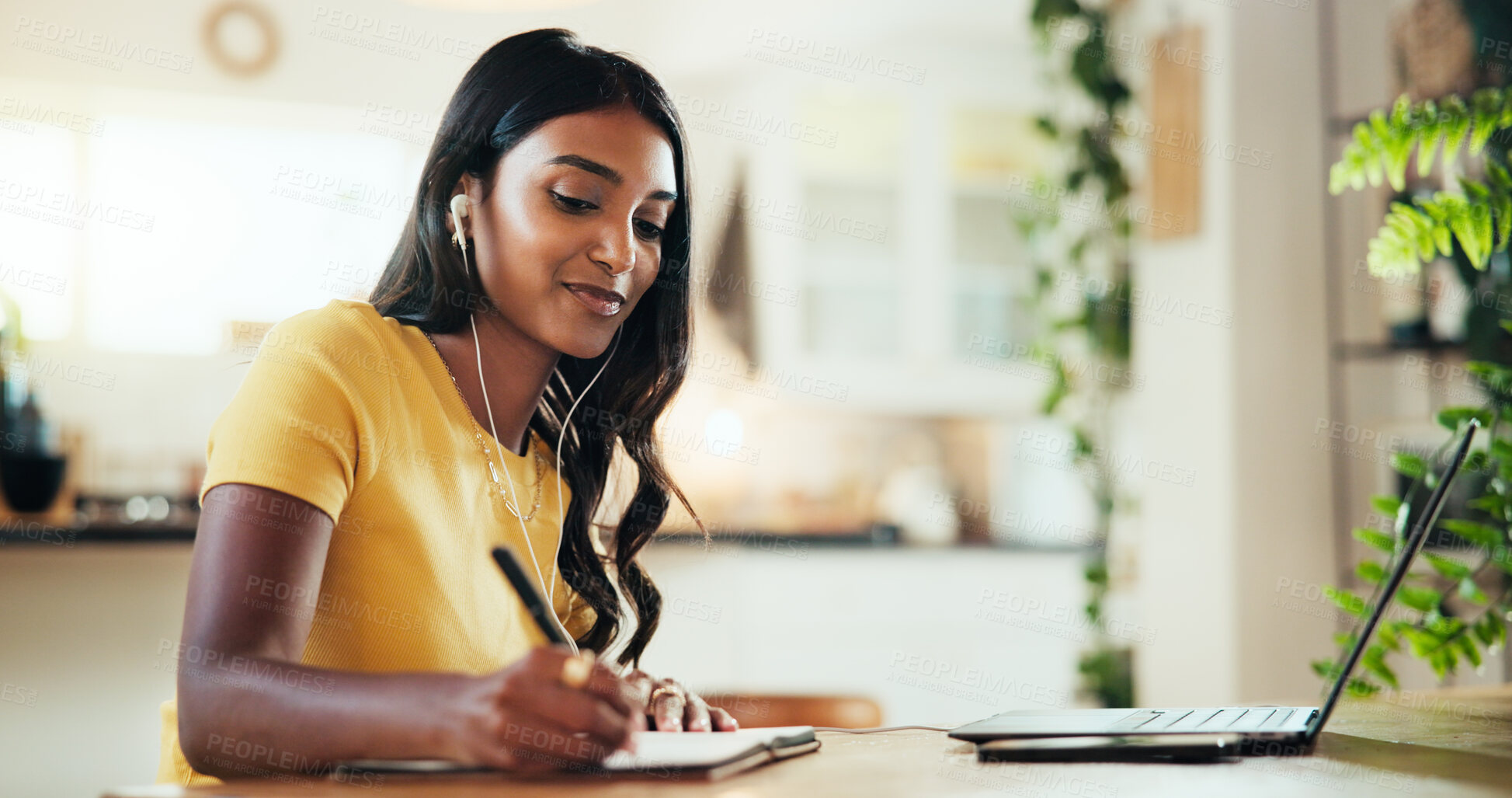 Buy stock photo Laptop, woman and writing notes for elearning, webinar course or remote education in home. Computer, college student and notebook in virtual meeting, study and earphones for lesson in online class