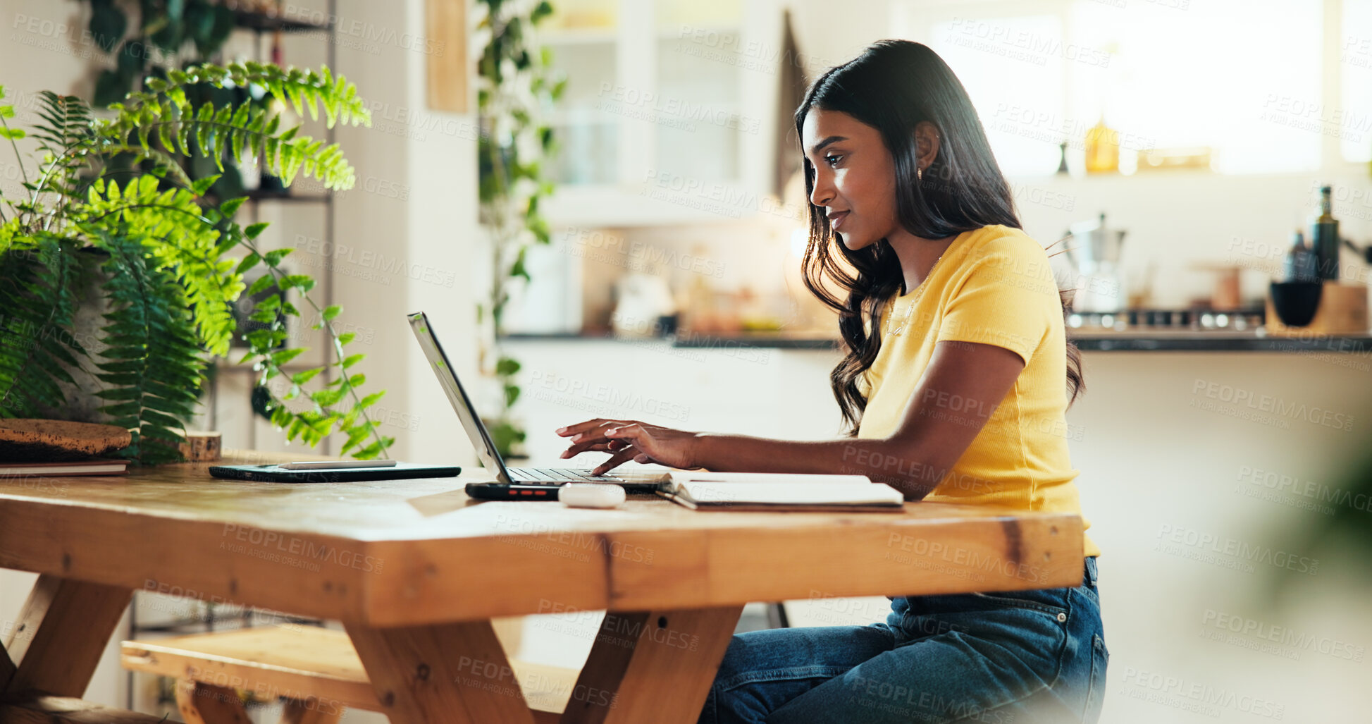 Buy stock photo Woman, student and typing with laptop in kitchen for online course, elearning or class schedule at home. Female person, studying and distance learning with computer for remote education or assignment