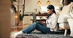 Student, research and laptop with woman in living room for scholarship application, college essay and class schedule. Typing, education and course with person on floor of home for exam results