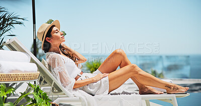 Buy stock photo Woman, sunbathing and relax with vacation, rest and smile for trip, break and travel. Luxury resort, peace and person with deck chair, adventure and carefree for hotel accommodation or hospitality