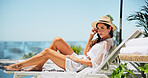 Woman, sunbathing and portrait with vacation, summer and relax for trip, break and travel. Luxury resort, peace and girl with deck chair, adventure and carefree for hotel accommodation or hospitality