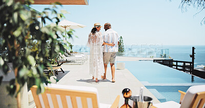 Buy stock photo Back, swimming pool and couple with vacation, view and bonding together with honeymoon. People, outdoor and man with woman, interracial and tropical island with hospitality, happiness or relationship