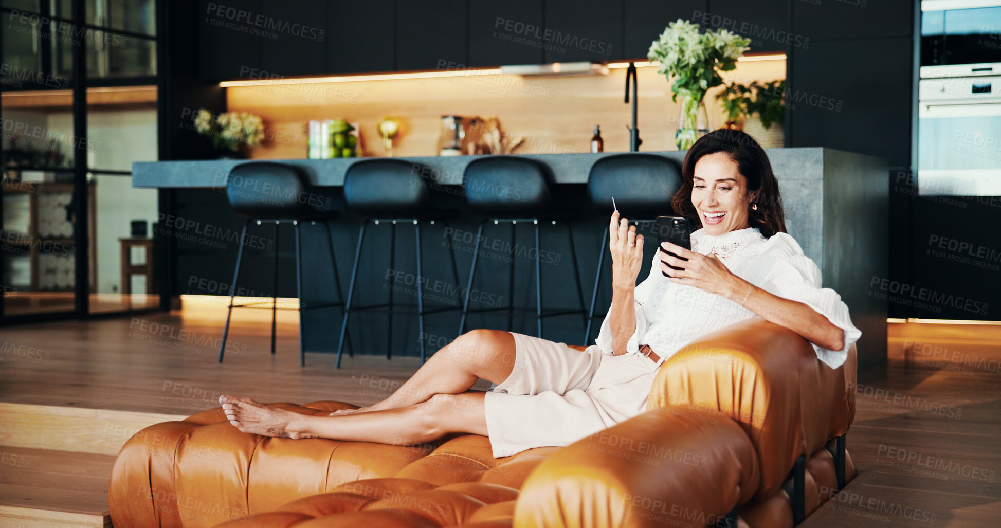 Buy stock photo Sofa, mature and happy woman with phone or credit card for online shopping, discount or payment. Safety, smile or person on fintech app or banking with rewards, voucher code and savings bonus in home