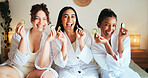 Cucumber, skincare and portrait of friends in bedroom for beauty, spa day and dermatology. Facial, natural cosmetics treatment and hotel resort with women for self care, luxury and relax together