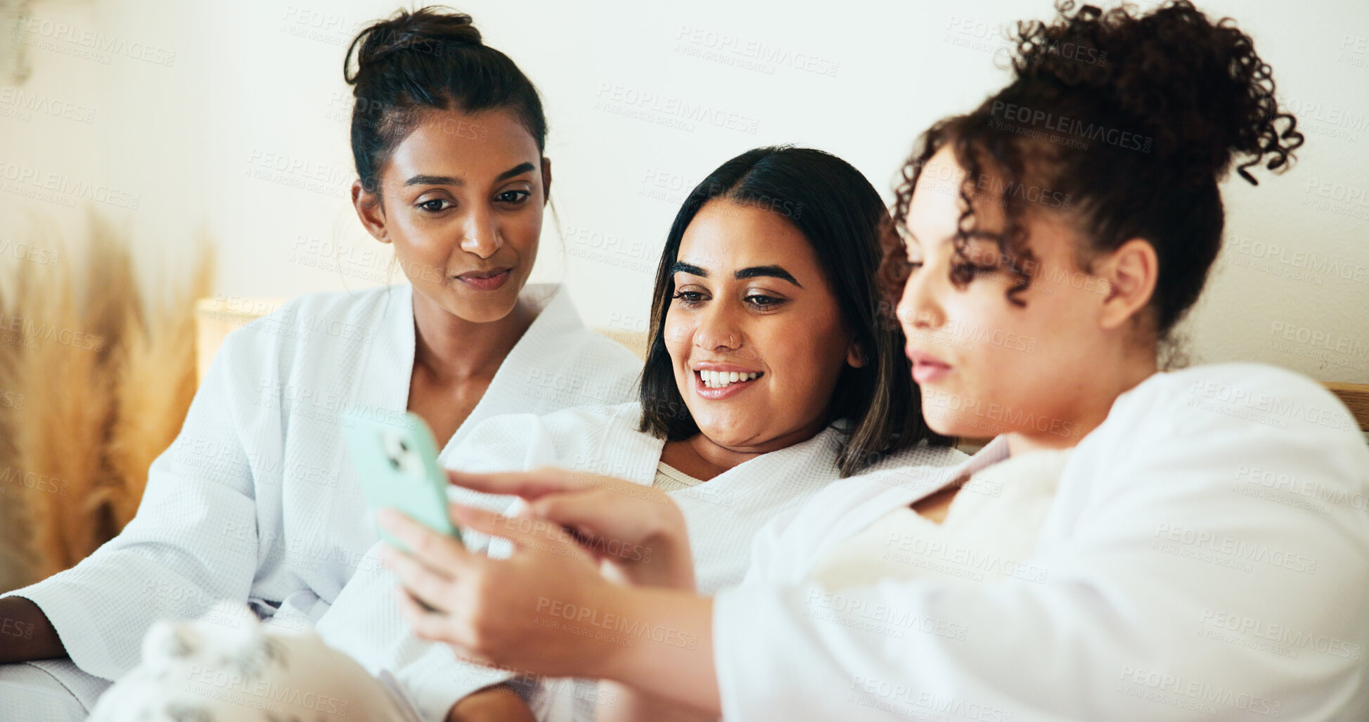 Buy stock photo Phone, friends and relax with women at hotel for spa review, online rating and social media post. Bonding, vacation and resort reputation with people reading on mobile for customer feedback.