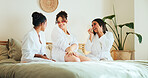 Eye patch, skincare and laugh with women in bedroom for beauty, spa day and dermatology. Facial, natural cosmetics treatment and hotel resort with women for self care, luxury and relax together