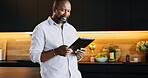 Kitchen, reading and tablet with mature black man in home as retired chef to search for online recipe. Information, instructions and research with person in apartment for cooking, ingredients or menu