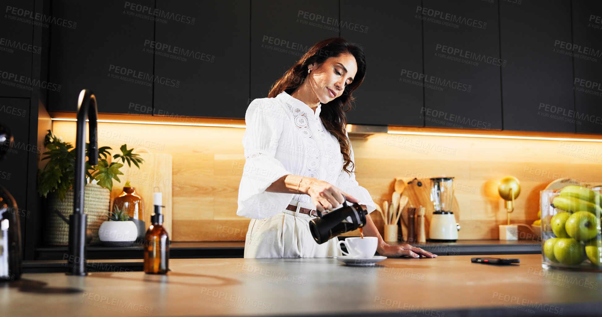Buy stock photo House, morning and woman in kitchen, coffee and start day with caffeine fix, latte and machine. Person, apartment and lady with mocha brew, cup and calm with peace, wake up and aroma with breakfast