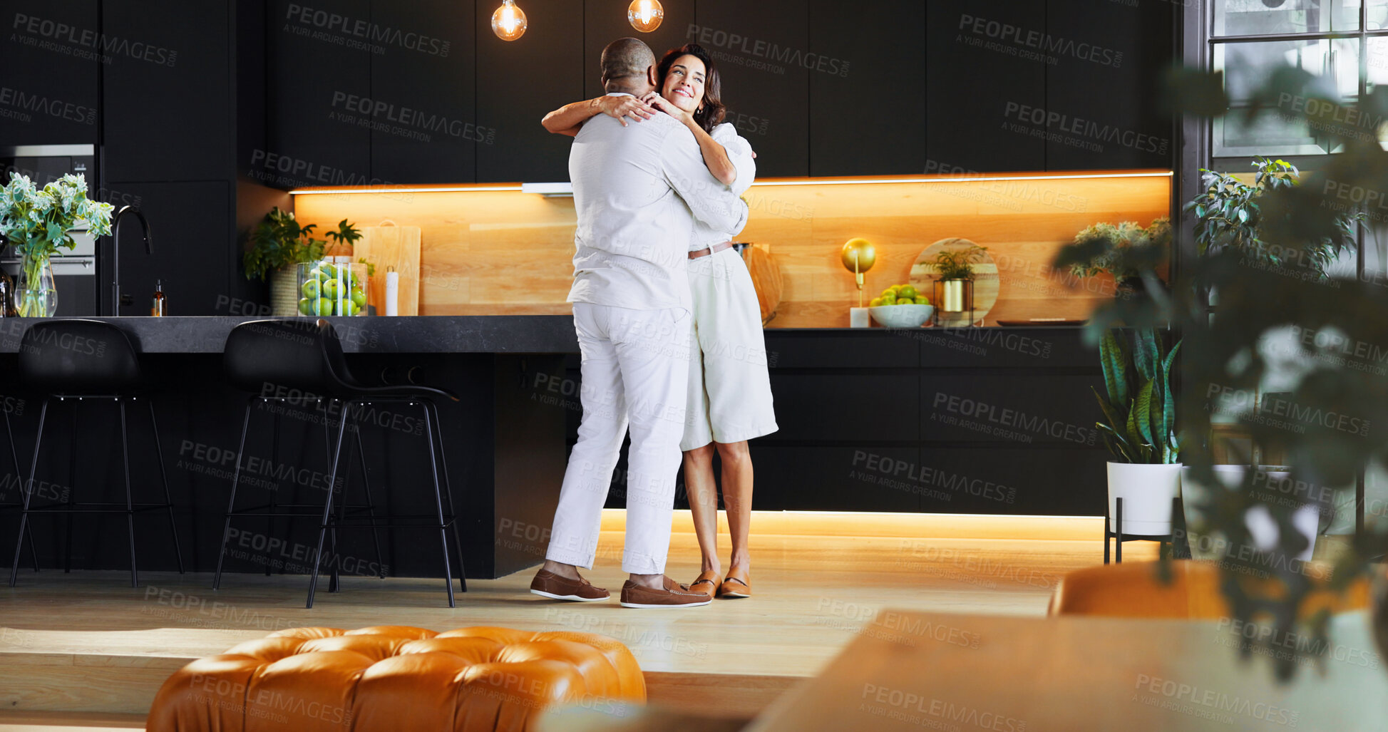 Buy stock photo Smile, dance and hug with interracial couple in kitchen for bonding, connection and romance. Happiness, support and care with man and woman at home for commitment, marriage and valentines day