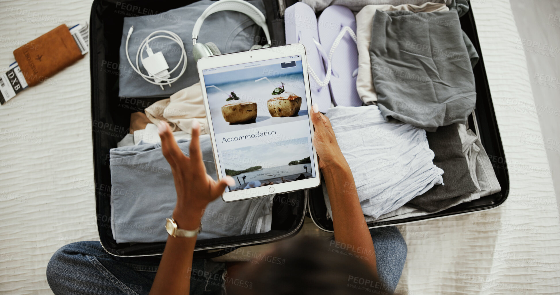 Buy stock photo Woman, hands and tablet screen with suitcase for travel, holiday or browsing website for vacation above at home. Top view, female person and technology with display or luggage for online getaway
