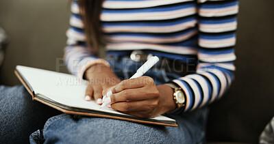 Buy stock photo Writing, education and hands with book, home and practice for exam in apartment, student and living room. Knowledge, learning and person with scholarship for college, lounge and learner in house